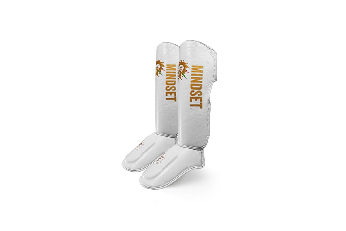 Muay Thai Shin Pads vs. Shin Guards vs. Thai Pads: What’s What & When to Use Them - warriors mindset