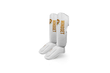 Muay Thai Shin Pads vs. Shin Guards vs. Thai Pads: What’s What & When to Use Them - warriors mindset